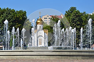 Russia, city of Anapa, chapel in the name of the prophet Hosea and  musical fountain on Soviets square in summer