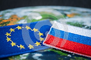 Russia and the European Union, Symbols of Russia and the EU flag on the background of the world map, Mutual relations and politics