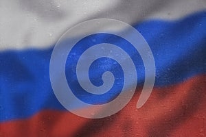 Russia flag on a texture background. Flag of Russia on the old grunge wall in the background, the concept of destruction and war