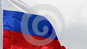 Russia flag waves in the wind in slow motion