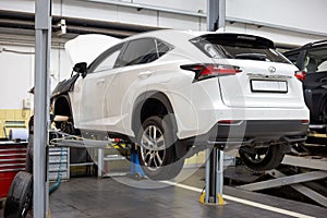 Russia, Izhevsk - April 21, 2018: Automobile workshop. Scheduled replacement and wheel alignment in workshop car