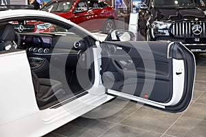 Russia, Izhevsk - February 20, 2020: Mercedes-Benz showroom. Interior of new E-200 coupe with automatic transmission