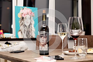 Russia Kemerovo 2019-01-19 Matsu El Picaro red Spanish Toro wine stands on a wooden table against the window, beautiful pictures,