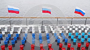 Russia, Krasnoyarsk, March 2020: many colorful plastic buckets.