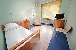 comfortable hospital ward with semi-double bed, photo