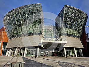 Interesting architecture of modern multi-storey Metropolis shopping center with glass atriums in Moscow