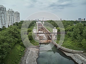 Russia, Moscow, May 2019 - Repairing of Sluice number 8 on the chanel Moscow-Volga, aerial drone view