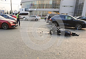 Russia, Moscow, 01.10.2020 Road accident involving a motorcycle. The motorcycle crashed after a road collision on the asphalt of t