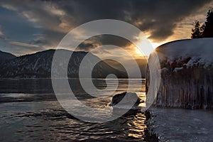 Russia. Mountain Altai. Sunset on lake Teletskoye.