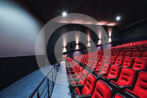 Russia, Nizhny Novgorod - may 26, 2014: Sormovsky Cinema. Empty red cinema hall seats, comfortable and soft chairs