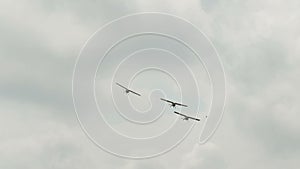 Russia, Novosibirsk, July 31, 2016: Three Extra aerobatic planes flying close.