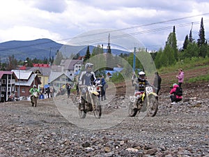 men on motorcycles ride in the mountains on the bikers highway