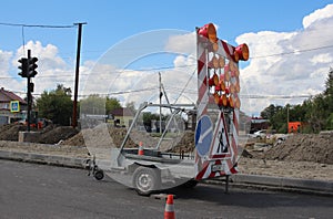 road repairs on the highway construction of asphalt in the city special working equipment cars