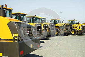 Russia, Novosibirsk - September 19, 2018: Excavator Loader Machine. Side View of Front Hoe Loader. Industrial Vehicle. Heavy