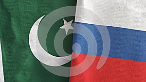 Russia and Pakistan two flags textile cloth 3D rendering