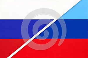 Russia or Russian Federation and Luhansk People`s Republic or LNR, symbol of two national flags from textile