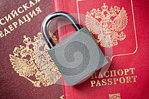 Russia Sanctions and Ukraine war concept. Russian Federation passports with padlock