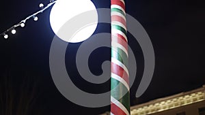 Russia St. Petersburg 01.06.2022 Lantern in the form of a candy cane. Christmas decoration