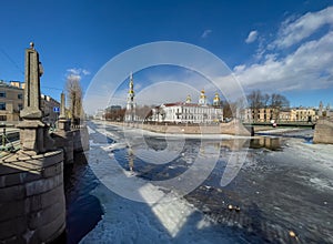 Russia, St. Petersburg, 01 April 2021: St. Nicholas Naval Cathedral belltower in a clear sunny day of spring, an ice