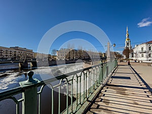 Russia, St. Petersburg, 01 April 2021: St. Nicholas Naval Cathedral belltower in a clear sunny day of spring, an ice