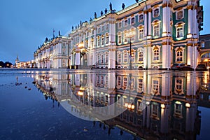 Russia, St. Petersburg, Hermitage buildings reflected in water,