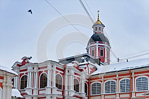 Russia, St. Petersburg, January 2022. The tower of the Annunciation Church and the surrounding buildings of the monastery.