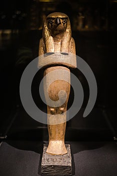 Russia, St. Petersburg - March 10, 2023: Figurine of an owl woman in the Museum of Ancient Egypt