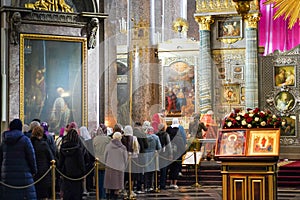 1.07.2021 Russia St. Petersburg. People lining to worship Our Lady icon in Kazan orthodox cathedral