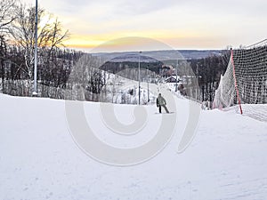 Russia Tatarstan Almetyevsk. Sports and recreation complex YAN. Snowboarder descent