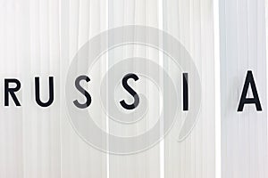 Russia text over a white plastic background. Russia federation