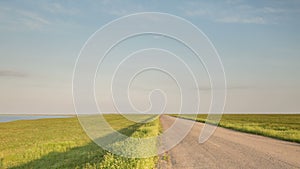 Russia, timelapse. The movement of clouds over the fields of winter wheat in early spring in the vast steppes of the Don.