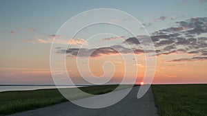 Russia, timelapse. The movement of clouds over the fields of winter wheat in early spring in the vast steppes of the Don.