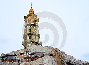 Russia, Troitskoe, March 21, 2021. A beautiful old lighthouse with a staircase among the rocks, with a restaurant inside, the