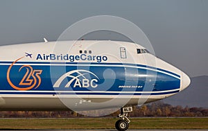 Cargo jet aircraft Boeing 747-BF of AirBridgeCargo Airlines company on a runway. Airplane`s fuselage. Aviation and transportation