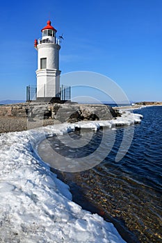 Russia. Vladivostok. The lighthouse of Egersheld1876 year built Tokarevskaya koshka in January in Amur bay