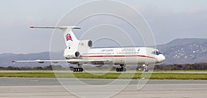 Passenger aircraft Tupolev Tu-154 of Air Koryo North Korea on runway. Aviation and transportation