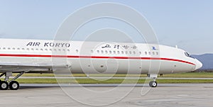 Passenger aircraft Tupolev Tu-154 of Air Koryo North Korea on runway. Aviation and transportation