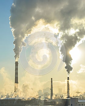 Russia . Yekaterinburg . Industrial production area on a blue sky background .