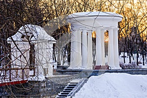 Russia. Yekaterinburg. Kharitonovsky garden in winter at sunset .