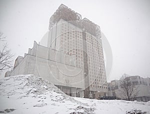 Postapocalypse huge building in cold winter. photo