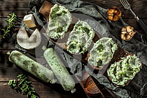 Russian bacon with traditional bread and herbal, garlic and cheese , on traditional wooden plate