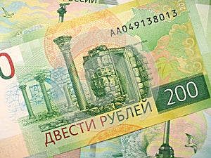 Russian banknote 200 rubles. The banknote depicts the sights of Tauric Chersonesos and a map of Crimea. Close-up