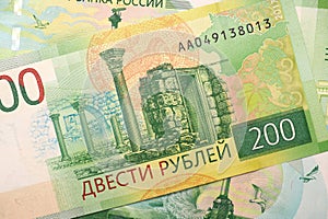 Russian banknote two hundred rubles. The banknote depicts the sights of Tauric Chersonesos and a map of Crimea. Close-up