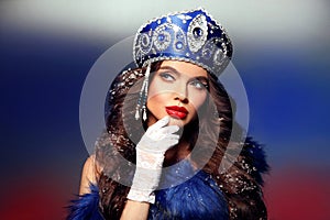 Russian beauty woman portrait. Fashion girl model with makeup and kokoshnik (woman's headdress in old Russia).