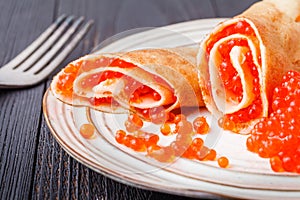 Russian blini - carnival pancakes with red caviar