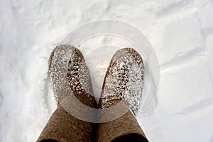 Russian boots in the snow on a cold winter day. photo
