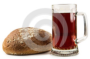 Russian brew in mug and loaf on white