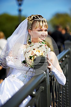 Russian bride with wedding bouquet