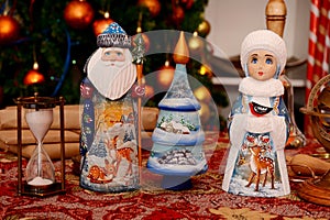 Russian Christmas figurine on the table in decorated room