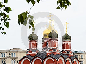 Russian church and birch leaves in Moscow city